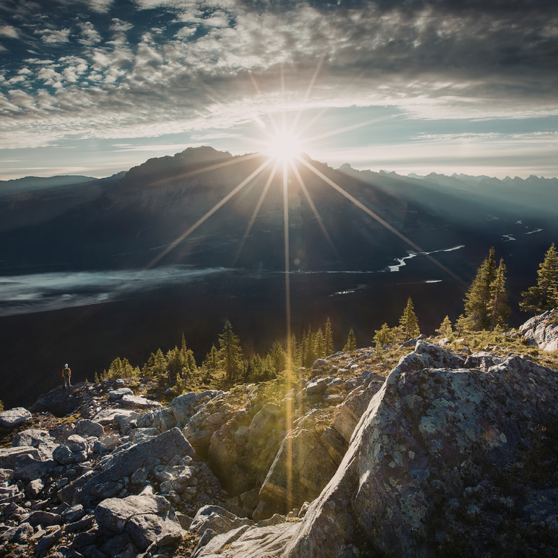 A sunrise over the mountains representing healthy beard maintenance.