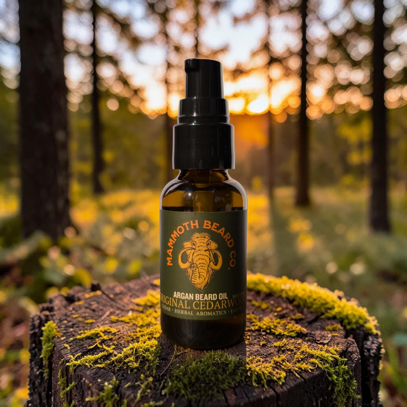 Bottle of Maxmoth Beard Co. beard oil on a tree stump in a forest setting